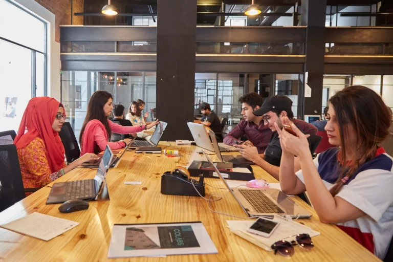 64abd035fcedae1b5baf403c_People working in a Colabs Coworking Space